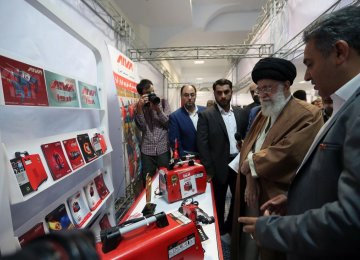Leader of Islamic Revolution Ayatollah Seyyed Ali Khamenei visits an exhibition featuring domestically made products in Tehran on April 29. 