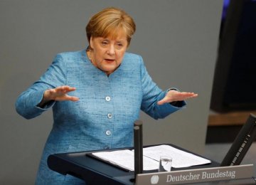 German Chancellor Angela Merkel speaks at the lower house of parliament Bundestag in Berlin on Wednesday.