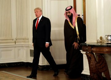 US President Donald Trump (L) and Saudi Crown Prince Mohammed bin Salman enter the State Dining Room of the White House in Washington on March 14, 2017. (File Photo)