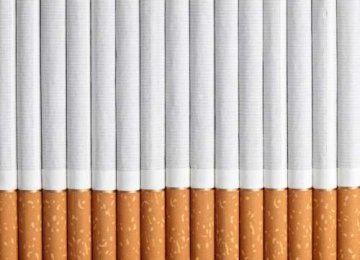 Cigarette Output  Rises 8% 