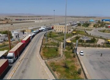 Long Lines of Trucks Held Up Behind Pakistani Border