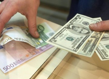 Currency, Gold Slightly Higher