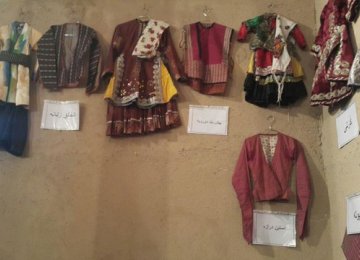 The local costumes of Abyaneh consist of long black trousers for men and a long floral dress for women.