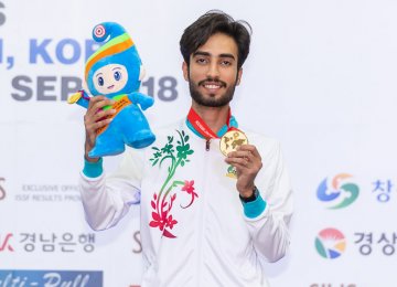 Nekounam Takes First Gold 