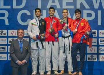 Ali Eshkevarian (left) took a silver medal in Tunisia. 