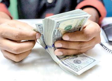 Dollar Surge Puts Iran’s FX Market Under Fresh Strain