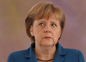 Merkel Urges ‘Fair’ Distribution of Migrants