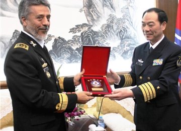 Commander Tours Chinese Naval Base