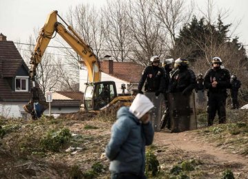 Bulldozers Start Clearing Calais Refugee Camp