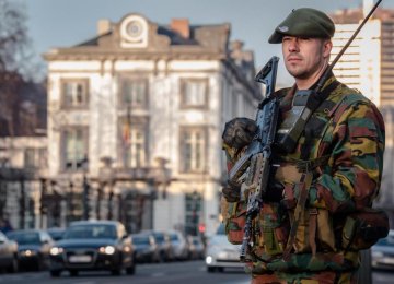 Belgium Arrests 16 Suspects,  France Intensifies Syria Strikes