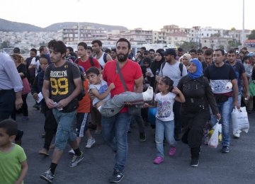 Thousands of Migrants Arrive in Austria