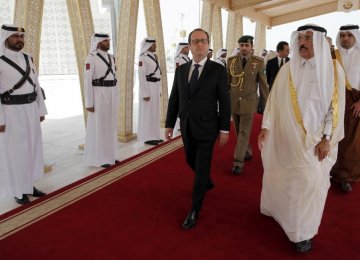 Hollande in Qatar for Warplane Deal