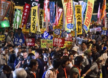 Opponents Vow to Fight  Japan’s Rising Military Role