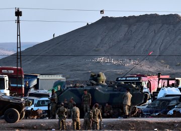 Turkey Stands by  as Kobane ‘About to Fall’