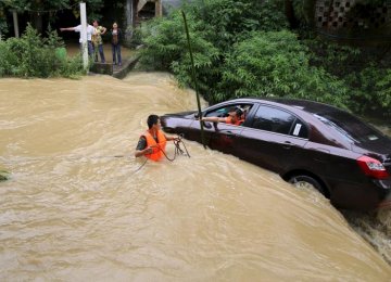 18 Dead in China Storms