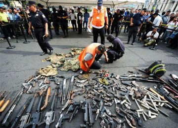 Philippine Rebels Give Up Arms