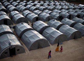 AI Censures Rich Nations’  Failure to Take Syria Refugees 