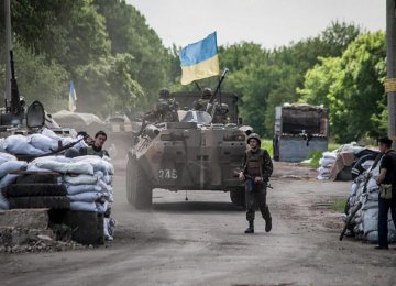 Shelling, Gunfire Strain  Fragile Ceasefire  in E Ukraine