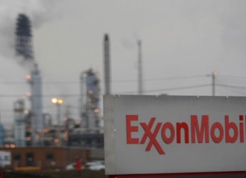 Exxon, Chevron Curtail Outlook