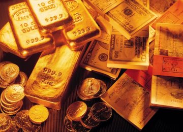 Bullion Tumbles  on Stronger Dollar	