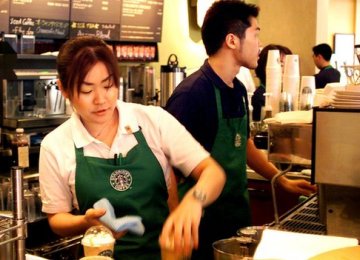 Starbucks Buys Japan Unit