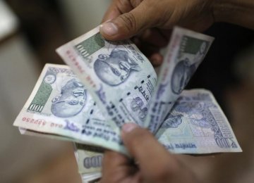 Rupee Best  Asian Currency in 2015