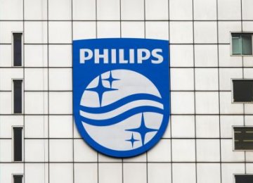 Philips Slashes Profit