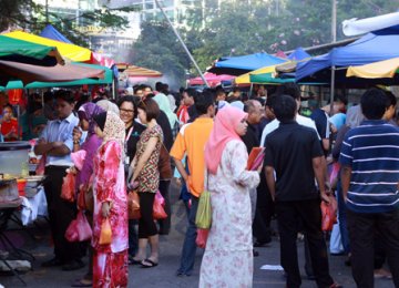 Malaysians’ Income Rises