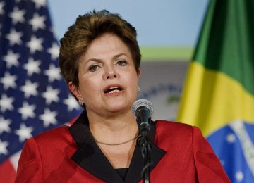 Rousseff Cuts Spending by 1/3 