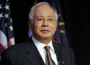 Malaysia PM Defends Development Policies