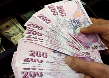Turks Move to Dollarization