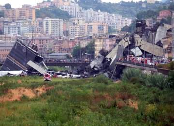 Rescuers scouring through the wreckage said there were “tens of victims”, while images  showed an entire carriageway plunged on to railway lines below.      
