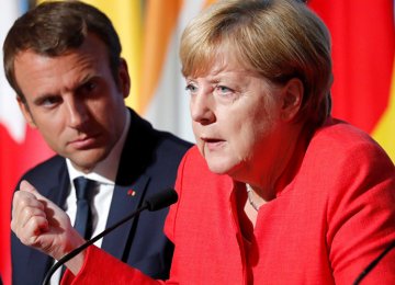 Merkel, Macron Eye Deeper Eurozone Integration After Brexit  