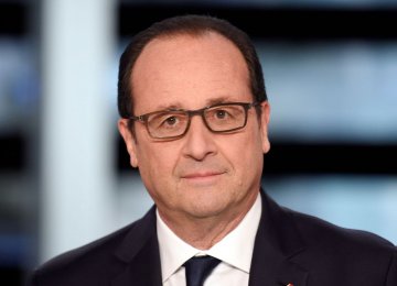 Hollande Decries Trump’s “Double Fault”