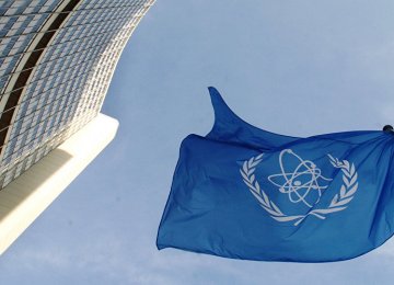 The IAEA’s flag flies in front of its headquarters in Vienna. 