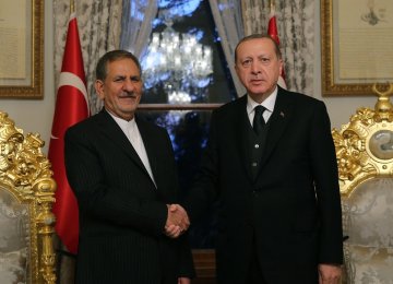 Turkish President Recep Tayyip Erdogan (R) meets Vice President Es'haq Jahangiri in Istanbul on Oct. 20.