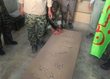 Hezbollah Receives Body of Iranian Martyr From IS