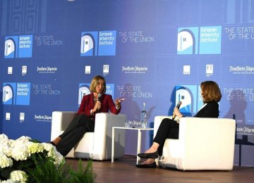 EU foreign policy chief, Federica Mogherini (L), speaks in a debate organized by the European University Institute in Florence on May 5. 