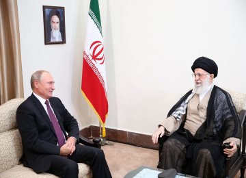 Leader of Islamic Revolution Ayatollah Seyyed Ali Khamenei (R) meets with Russian President Vladimir Putin in Tehran on Friday. 