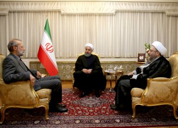 President Hassan Rouhani is flanked by Majlis Speaker Ali Larijani (L) and Judiciary Chief Sadeq Amoli Larijani in a meeting in Tehran on Nov. 25.  