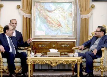 Iraq's Vice President Nouri al-Maliki (L) meets Secretary of Iran's Supreme National Security Council Ali Shamkhani in Tehran on Jan. 3. 