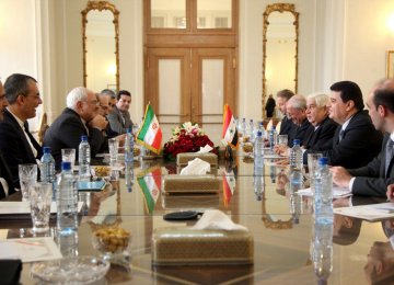 Iranian and Syrian diplomatic delegations meet in Tehran on Dec. 31.