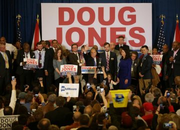 Democratic Alabama US Senate candidate Doug Jones addresses supporters at the election night party in Alabama on December 12.