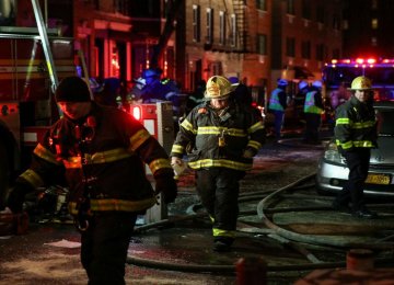 NY Fire Kills 12, Sends Residents Scrambling