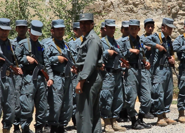 Afghan soldiers standing in formation with their Kalashnikov rifles in Kabul