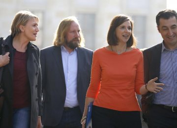 Leaders of the German Green Party arrive for the second day of the exploratory talks with CDU/CSU about forming a new coalition government in Berlin, Germany, October 19.