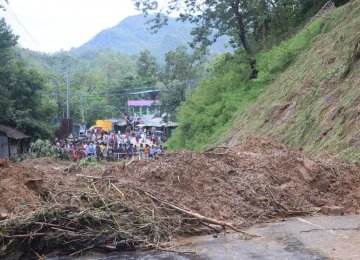 Rescuers Battle to Reach Victims of Bangladesh Landslides