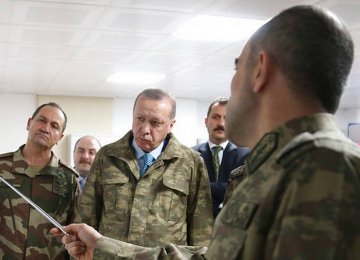 Erdogan Threatens to Expand Syria Offensive Despite Criticism