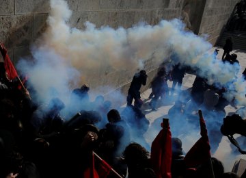 Greek Police  Fire Teargas  at Protesters