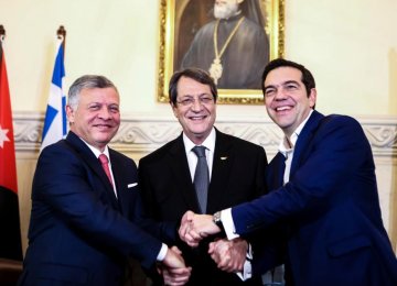 Cypriot President Nicos Anastasiades (C), Greek Prime Minister Alexis Tsipras (R) and Jordan’s King Abdullah
